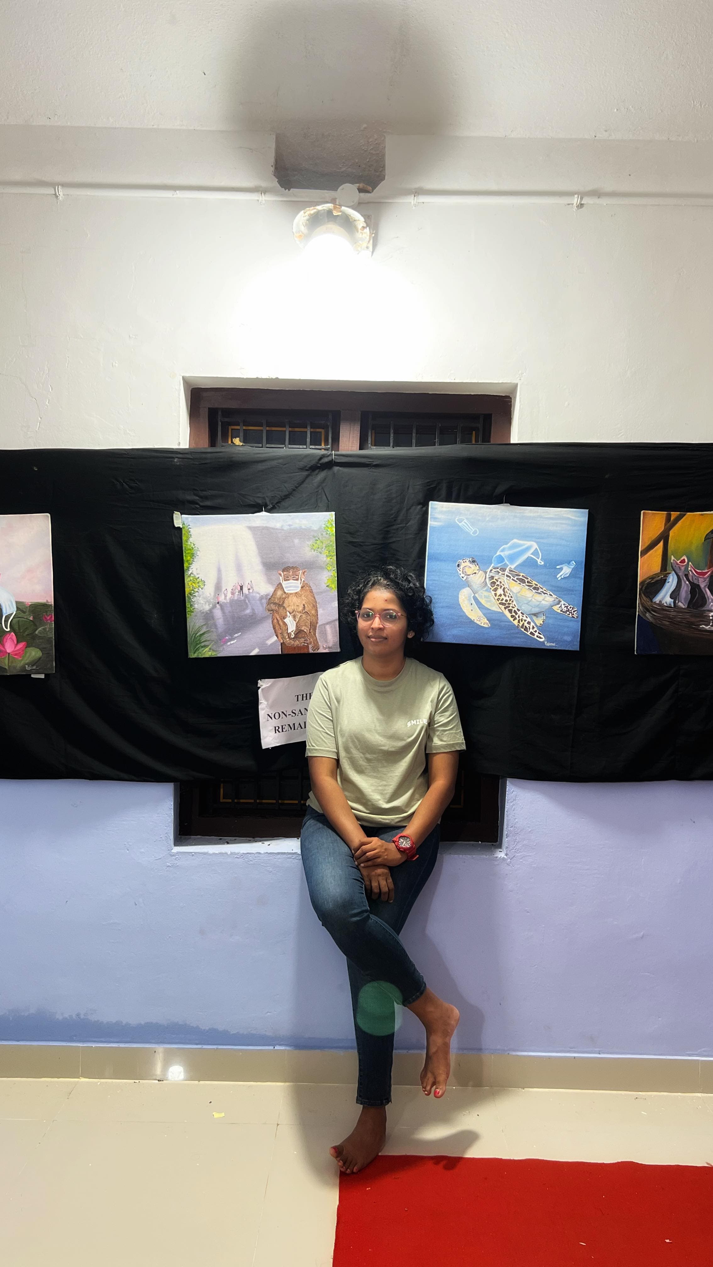 Raji Mol working on a canvas